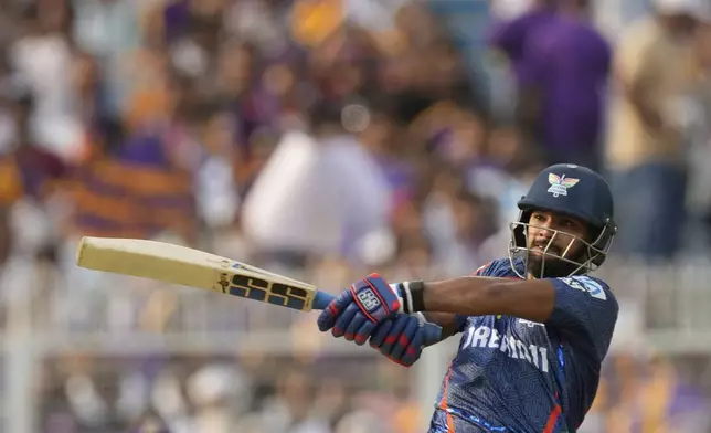 Lucknow Super Giants' Nicholas Pooran plays a shot during the Indian Premier League cricket match between Kolkata Knight Riders and Lucknow Super Giants at Eden Gardens in Kolkata, India, Tuesday, April 8, 2025. (AP Photo/Bikas Das)