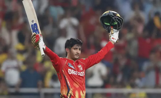 Punjab Kings' Priyansh Arya celebrates after scoring a century during the Indian Premier League cricket match between Punjab Kings and Chennai Super Kings at Maharaja Yadavindra Singh Cricket Stadium in Mohali, India, Tuesday, April 8, 2025. (AP Photo/Surjeet Yadav)