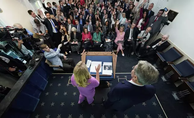 White House press secretary Karoline Leavitt and Treasury Secretary Scott Bessent participate in a press briefing at the White House, Tuesday, April 29, 2025, in Washington. (AP Photo/Evan Vucci)