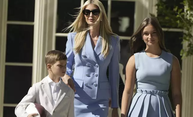 Ivanka Trump walks with two of her children before President Donald Trump welcomes the Super Bowl champion Philadelphia Eagles NFL football team to the South Lawn of the White House, Monday, April 28, 2025, in Washington. (AP Photo/Mark Schiefelbein)