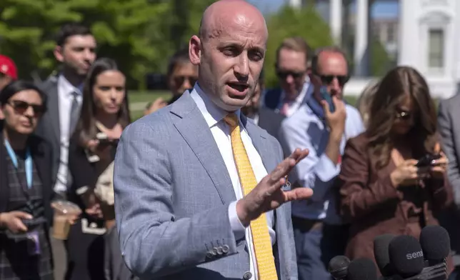 White House deputy chief of staff for policy Stephen Miller speaks with reporters outside the White House, Monday, April 28, 2025, in Washington. (AP Photo/Mark Schiefelbein)