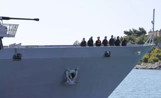 An Italian navy ship approaches the port , as Italian authorities transfer 40 migrants with no permission to remain in the country to Italian-run migration detention centers in Albania, in Shengjin, northwestern Albania, Friday, April 11, 2025. (AP Photo/Vlasov Sulaj)