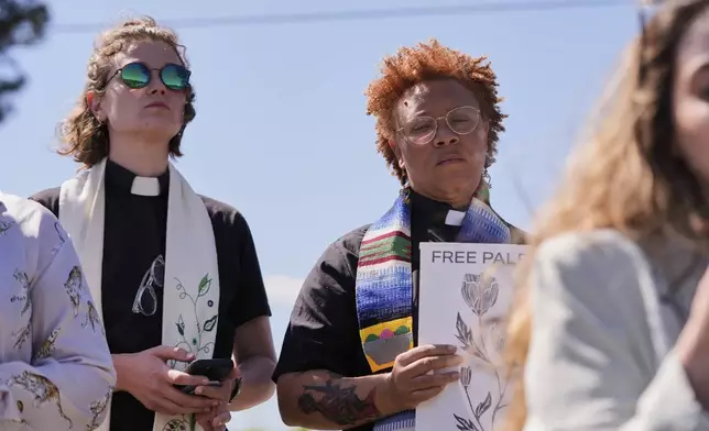 Clergy stand during a news conference of supporters outside the Central Louisiana ICE Processing Center in Jena, La., after an immigration hearing for Mahmoud Khalil, the Columbia University activist facing deportation for his role in pro-Palestinian campus protests, Friday, April 11, 2025. (AP Photo/Gerald Herbert)