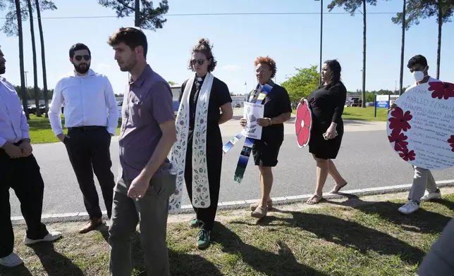 Supporters leave at the end of a news conference outside the Central Louisiana Ice Processing Center in Jena, La., after an immigration hearing for Mahmoud Khalil, the Columbia University activist facing deportation for his role in pro-Palestinian campus protests, Friday, April 11, 2025. (AP Photo/Gerald Herbert)