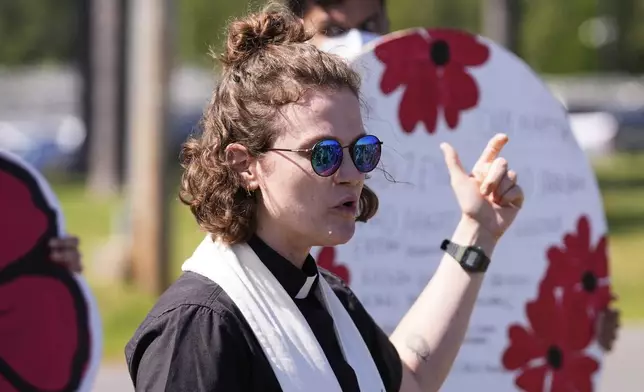 Liv Thomas, candidate for ordination in the Presbyterian Church, speaks outside the Central Louisiana ICE Processing Center in Jena, La., after an immigration hearing for Mahmoud Khalil, the Columbia University activist facing deportation for his role in pro-Palestinian campus protests, Friday, April 11, 2025. (AP Photo/Gerald Herbert)