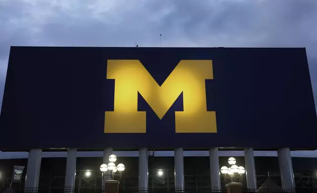 FILE - The block M logo for the University of Michigan is displayed at the school's NCAA college football stadium in Ann Arbor, Mich., on Nov. 10, 2023. (AP Photo/Paul Sancya, File)