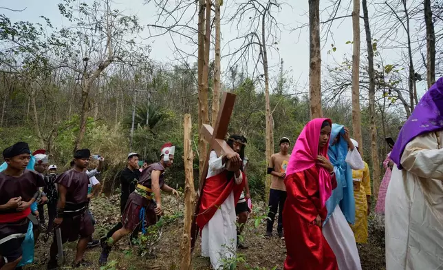 Christians reenact the crucifixion of Jesus Christ to mark Good Friday in Guwahati, India, Friday, April 18, 2025. (AP Photo/Anupam Nath)