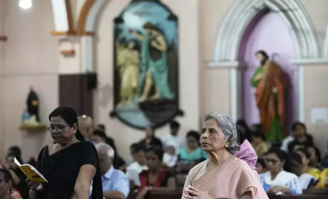 Christians attend a prayer service at the St. Teresa's Church, marking Good Friday, in Kolkata, India, Friday, April 18, 2025. (AP Photo/Bikas Das)