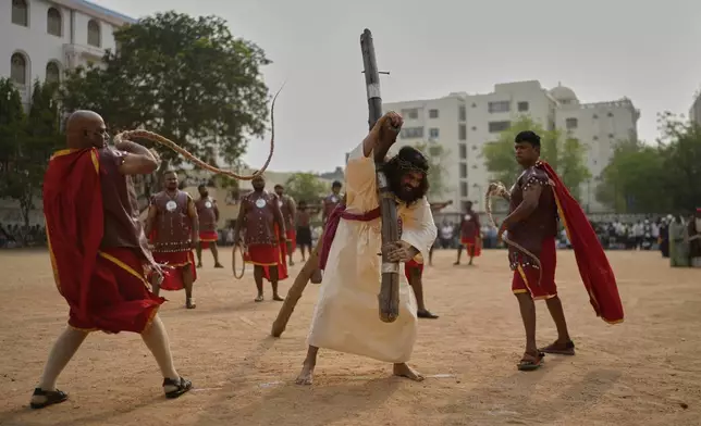 Christians reenact the crucifixion of Jesus Christ to mark Good Friday in Hyderabad, India, Friday, April 18, 2025. (AP Photo/Mahesh Kumar A.)