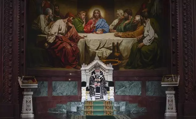 Russian Orthodox Church Patriarch Kirill, center, attends the service during the Good Friday in the Christ The Savior Cathedral in Moscow, Russia, on Friday, April 18, 2025. (Sergey Vlasov/Russian Orthodox Church Press Service via AP)