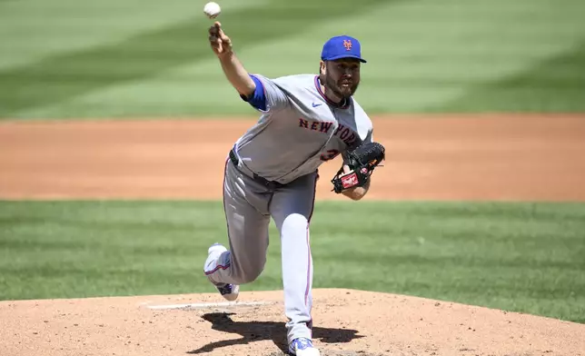 New York Mets starting pitcher Tylor Megill throws during the second inning of a baseball game against the Washington Nationals, Sunday, April 27, 2025, in Washington. (AP Photo/Nick Wass)