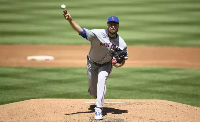 New York Mets starting pitcher Tylor Megill throws during the second inning of a baseball game against the Washington Nationals, Sunday, April 27, 2025, in Washington. (AP Photo/Nick Wass)