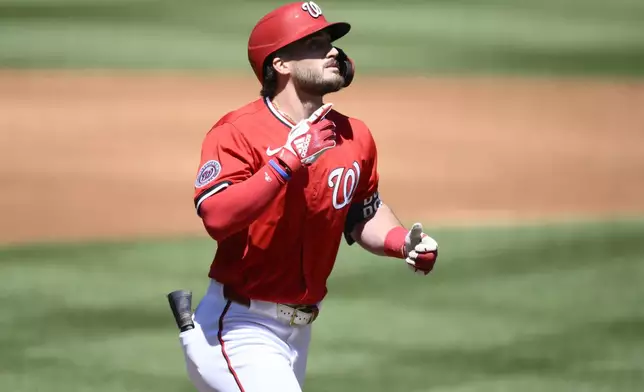 Washington Nationals' Dylan Crews celebrates after his home run during the second inning of a baseball game against the New York Mets, Sunday, April 27, 2025, in Washington. (AP Photo/Nick Wass)