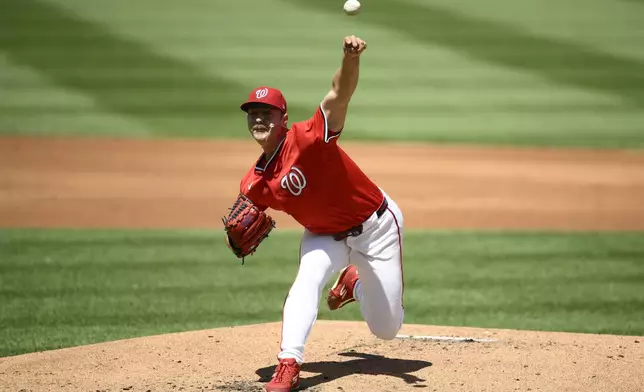 Washington Nationals starting pitcher Mitchell Parker throws during the second inning of a baseball game against the New York Mets, Sunday, April 27, 2025, in Washington. (AP Photo/Nick Wass)