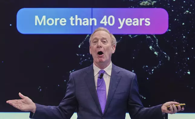Microsoft's President Brad Smith speaks at a conference on digital resilience during geopolitical volatility in Brussels, Wednesday, April 30, 2025. (AP Photo/Virginia Mayo)