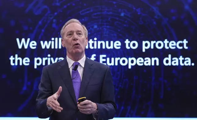 Microsoft's President Brad Smith speaks at a conference on digital resilience during geopolitical volatility in Brussels, Wednesday, April 30, 2025. (AP Photo/Virginia Mayo)