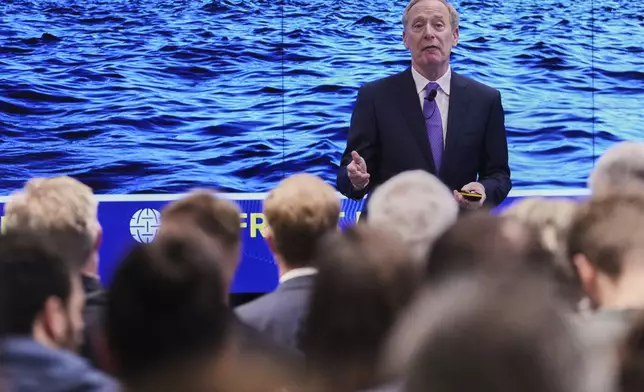 Microsoft's President Brad Smith speaks during a conference on digital resilience during geopolitical volatility in Brussels, Wednesday, April 30, 2025. (AP Photo/Virginia Mayo)