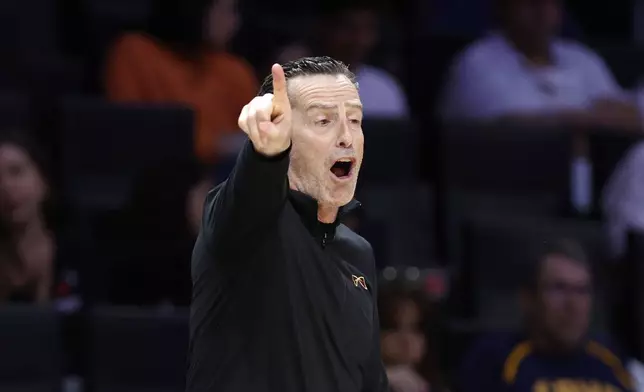 Cleveland Cavaliers head coach Kenny Atkinson reacts during the second half in Game 4 of an NBA basketball first-round playoff series against the Miami Heat, Monday, April 28, 2025, in Miami. (AP Photo/Rhona Wise)