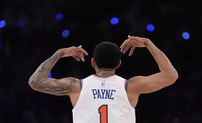 New York Knicks guard Cameron Payne reacts during the first half of Game 1 in an NBA basketball first-round playoff series against the Detroit Pistons, Saturday, April 19, 2025, in New York. (AP Photo/Julia Demaree Nikhinson)