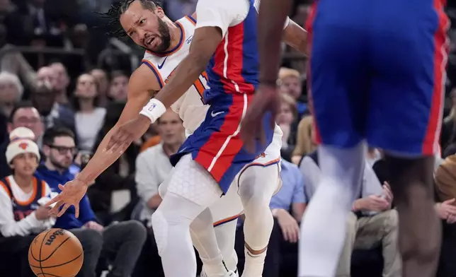 New York Knicks guard Jalen Brunson reaches for the ball during the first half of Game 1 in an NBA basketball first-round playoff series against the Detroit Pistons, Saturday, April 19, 2025, in New York. (AP Photo/Julia Demaree Nikhinson)