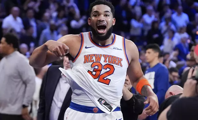 New York Knicks center Karl-Anthony Towns (32) reacts following Game 1 in an NBA basketball first-round playoff series against the Detroit Pistons, Saturday, April 19, 2025, in New York. (AP Photo/Julia Demaree Nikhinson)