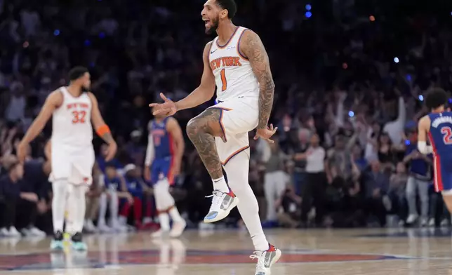 New York Knicks guard Cameron Payne reacts during the second half of Game 1 in an NBA basketball first-round playoff series against the Detroit Pistons, Saturday, April 19, 2025, in New York. (AP Photo/Julia Demaree Nikhinson)