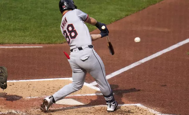 Cleveland Guardians' Steven Kwan singles off Pittsburgh Pirates pitcher Paul Skenes, driving in a run, during the third inning of a baseball game in Pittsburgh, Saturday, April 19, 2025. (AP Photo/Gene J. Puskar)