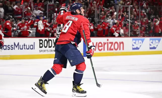 Washington Capitals left wing Alex Ovechkin (8) celebrates his goal in the first period of Game 5 of a first-round NHL hockey playoff series against the Montreal Canadiens, Wednesday, April 30, 2025, in Washington. (AP Photo/Nick Wass)