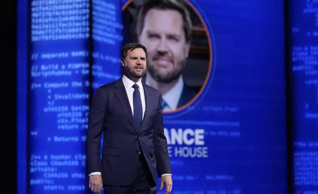 Vice President JD Vance walks on stage to speak at Bitcoin 2025, Wednesday, May 28, 2025, in Las Vegas. (AP Photo/John Locher)