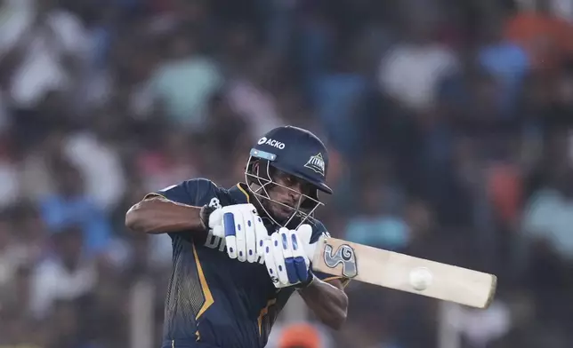 Gujarat Titans' Sai Sudharsan plays a shot during the Indian Premier League cricket match between Gujarat Titans and Sunrisers Hyderabad at Narendra Modi Stadium in Ahmedabad, India, Friday, May 2, 2025. (AP Photo/Siddharaj Solanki)