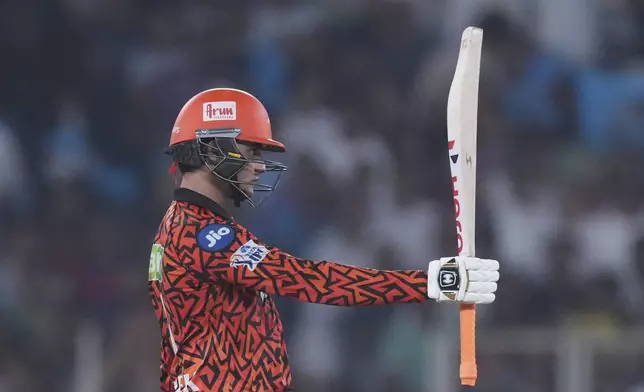 Sunrisers Hyderabad's Abhishek Sharma celebrates after scoring fifty runs during the Indian Premier League cricket match between Gujarat Titans and Sunrisers Hyderabad at Narendra Modi Stadium in Ahmedabad, India, Friday, May 2, 2025. (AP Photo/Siddharaj Solanki)