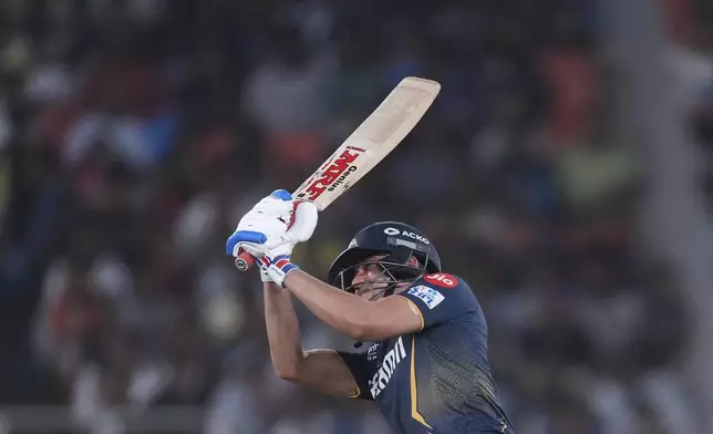 Gujarat Titans' captain Shubman Gill plays a shot during the Indian Premier League cricket match between Gujarat Titans and Sunrisers Hyderabad at Narendra Modi Stadium in Ahmedabad, India, Friday, May 2, 2025. (AP Photo/Siddharaj Solanki)