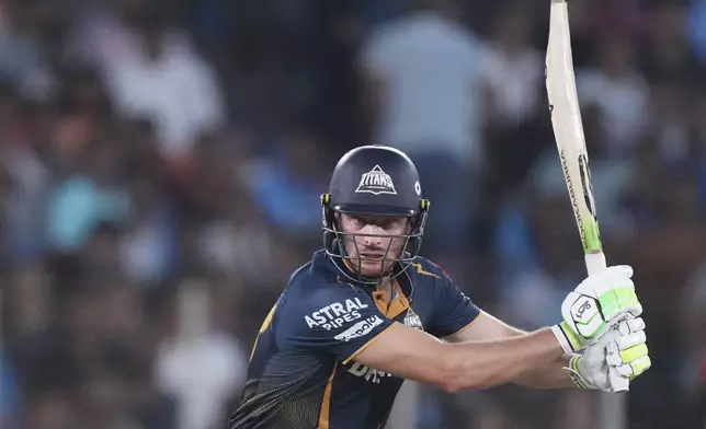 Gujarat Titans' Jos Butler plays a shot during the Indian Premier League cricket match between Gujarat Titans and Sunrisers Hyderabad at Narendra Modi Stadium in Ahmedabad, India, Friday, May 2, 2025. (AP Photo/Siddharaj Solanki)