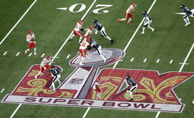 FILE - Kansas City Chiefs quarterback Patrick Mahomes (15) looks to pass the ball during the NFL Super Bowl 59 football game against the Philadelphia Eagles Sunday, Feb. 9, 2025, in New Orleans. The Eagles won 40-22. (AP Photo/Adam Hunger, File)