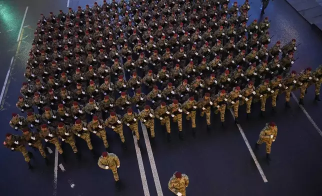 Troops march toward Red Square to attend a rehearsal for the Victory Day military parade in Moscow, Russia, on Tuesday, April 29, 2025. (AP Photo/Alexander Zemlianichenko)
