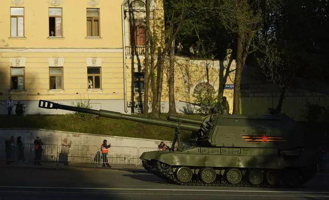 A Russian Msta-S self-propelled howitzer rolls along the Garden Ring towards the Red Square, Saturday, May 3, 2025. prior to the Victory Day military parade rehearsal in Moscow, Russia, (AP Photo/Pavel Bednyakov)