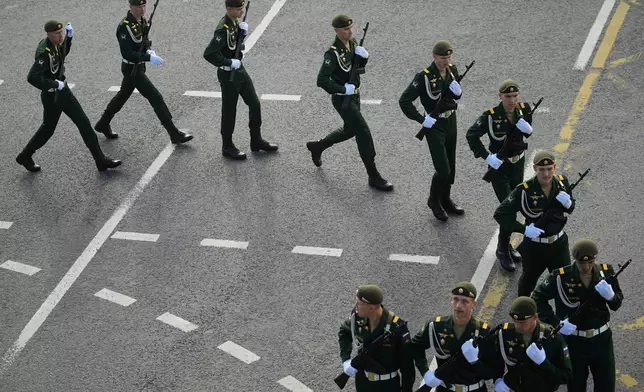 Russian servicemen gather prior to the Victory Day military parade general rehearsal in Moscow, Russia, Wednesday, May 7, 2025. (AP Photo/Pavel Bednyakov)