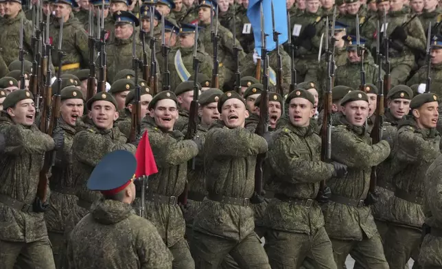 Troops march during a rehearsal for the Victory Day military parade at the Dvortsovaya (Palace) Square in St. Petersburg, Russia, Wednesday, April 30, 2025. (AP Photo/Dmitri Lovetsky)