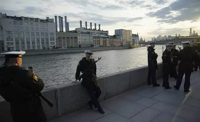 Russian serviceman poses for a photo prior to the Victory Day military parade rehearsal in Moscow, Russia, Saturday, May 3, 2025. (AP Photo/Pavel Bednyakov)