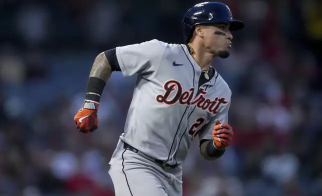 Detroit Tigers' Javier Baez runs the bases after hitting a home run during the third inning of a baseball game against the Los Angeles Angels, Thursday, May 1, 2025, in Anaheim, Calif. (AP Photo/Eric Thayer)