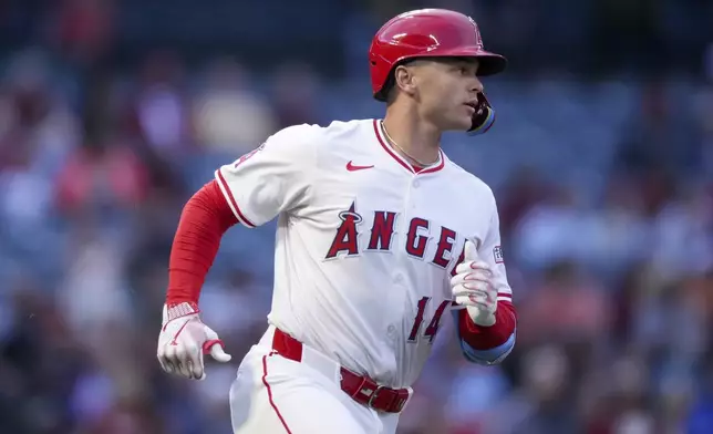 Los Angeles Angels designated hitter Logan O'Hoppe runs to first base after hitting a home run during the second inning of a baseball game against the Detroit Tigers, Thursday, May 1, 2025, in Anaheim, Calif. (AP Photo/Eric Thayer)