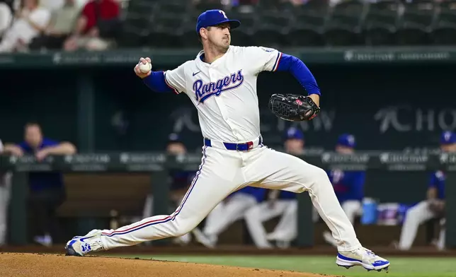 Texas Rangers starting pitcher Tyler Mahle throws a pitch during the first inning of a baseball game against the Toronto Blue Jays, Wednesday, May 28, 2025, in Arlington, Texas. (AP Photo/Ronaldo Bolaños)