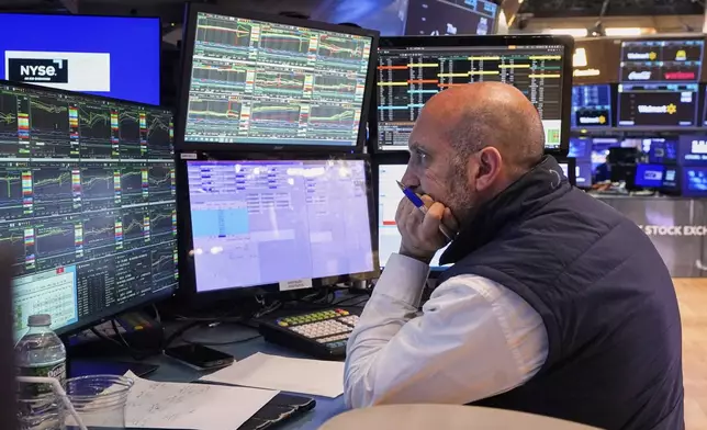 Specialist James Denaro works at his post on the floor of the New York Stock Exchange, Tuesday, May 20, 2025. (AP Photo/Richard Drew)