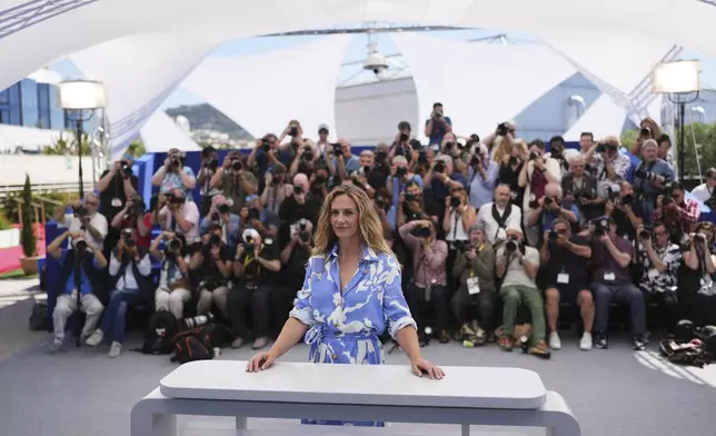 Cecile de France poses for photographers at the photo call for the film 'Dalloway' at the 78th international film festival, Cannes, southern France, Thursday, May 15, 2025. (Photo by Lewis Joly/Invision/AP)