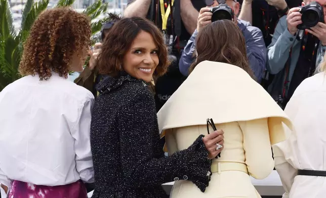Jury members Leila Slimani, left, and Halle Berry, pose with jury president Juliette Binoche at the jury photo call at the 78th international film festival, Cannes, southern France, Tuesday, May 13, 2025. (Photo by Joel C Ryan/Invision/AP)