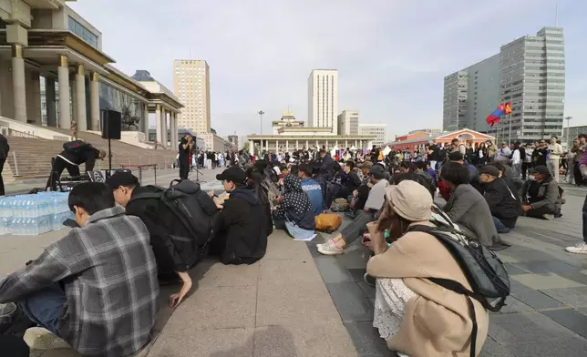 Protestors gather at a rally calling for the Prime Minister's resignation at the Sukhbaatar Square in Ulaanbaatar, Mongolia, Thursday, May 22, 2025. (AP Photo/Ganbat Namjilsangarav)