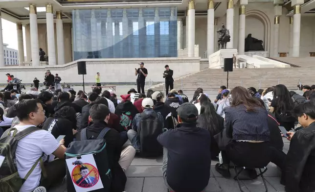 Protestors gather at a rally calling for the Prime Minister's resignation at the Sukhbaatar Square in Ulaanbaatar, Mongolia, Thursday, May 22, 2025. (AP Photo/Ganbat Namjilsangarav)