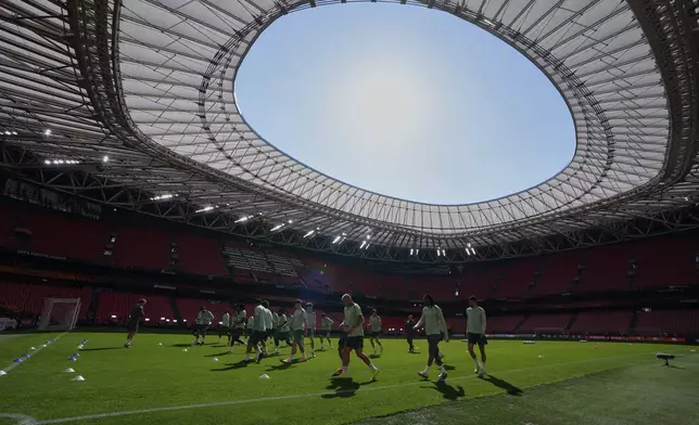 Tottenham players train during a training session ahead of the Europa League final soccer match against Manchester United at the San Mames Stadium in Bilbao, Spain, Tuesday, May 20, 2025. (AP Photo/Manu Fernandez)