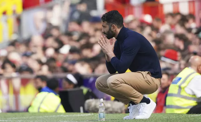 Manchester United's head coach Ruben Amorim reacts during the English Premier League soccer match between Manchester United and West Ham at Old Trafford stadium in Manchester, England, Sunday, May 11, 2025. (AP Photo/Ian Hodgson)