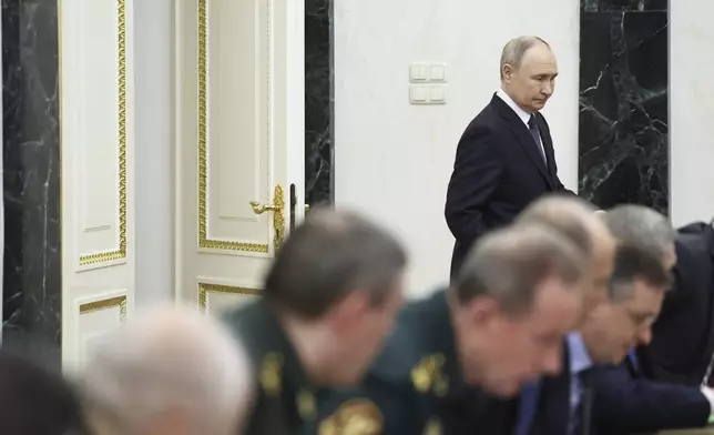 Russian President Vladimir Putin attends a meeting on forthcoming Russia-Ukraine talks in Istanbul, in Moscow, Russia, Wednesday, May 14, 2025. (Alexander Kazakov, Sputnik, Kremlin Pool Photo via AP)